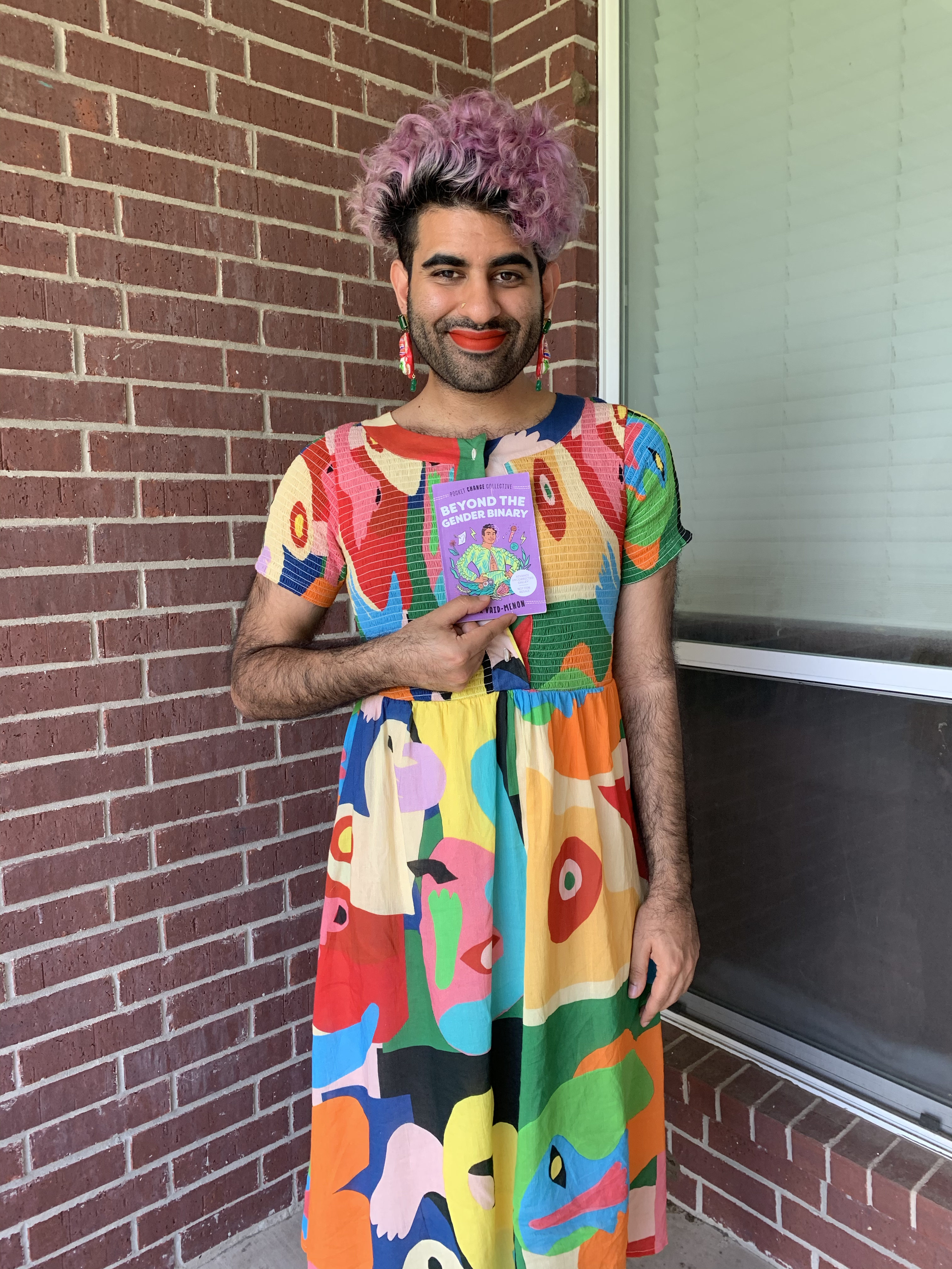 How this Gender Non-Conforming Artist is Saving Lives with a Book Drive